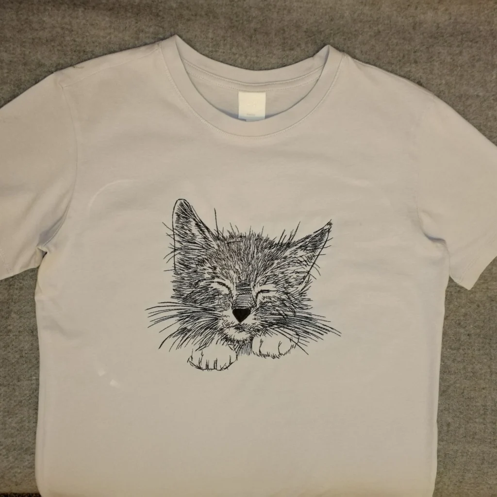 Sleeping cat embroidery design